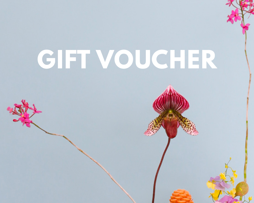 Gift voucher with a colorful floral arrangement on a light blue background